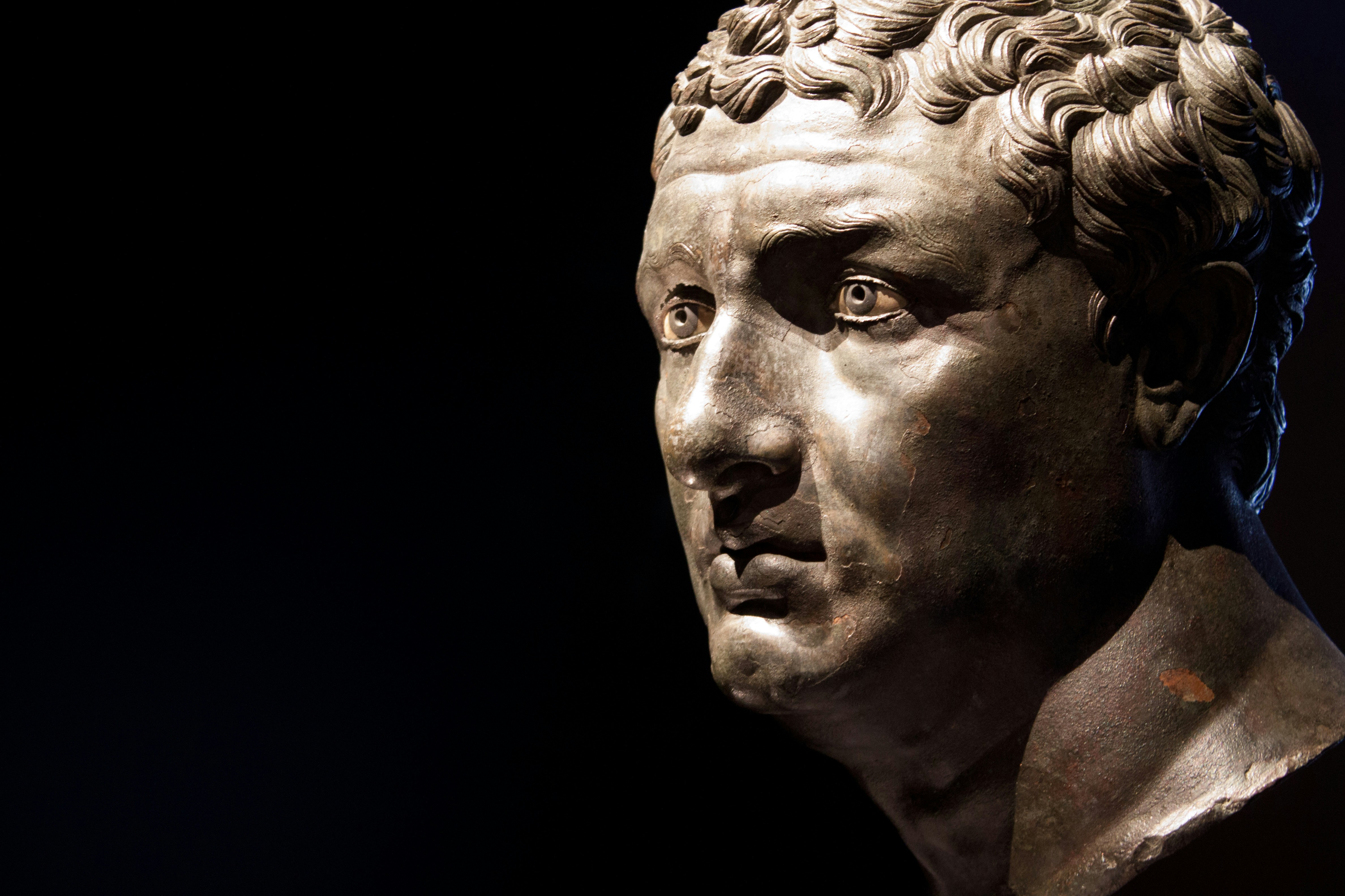 A close up of a statue of a man