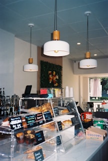 A bakery with a lot of donuts on display
