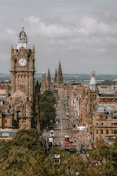A large clock tower towering over a city