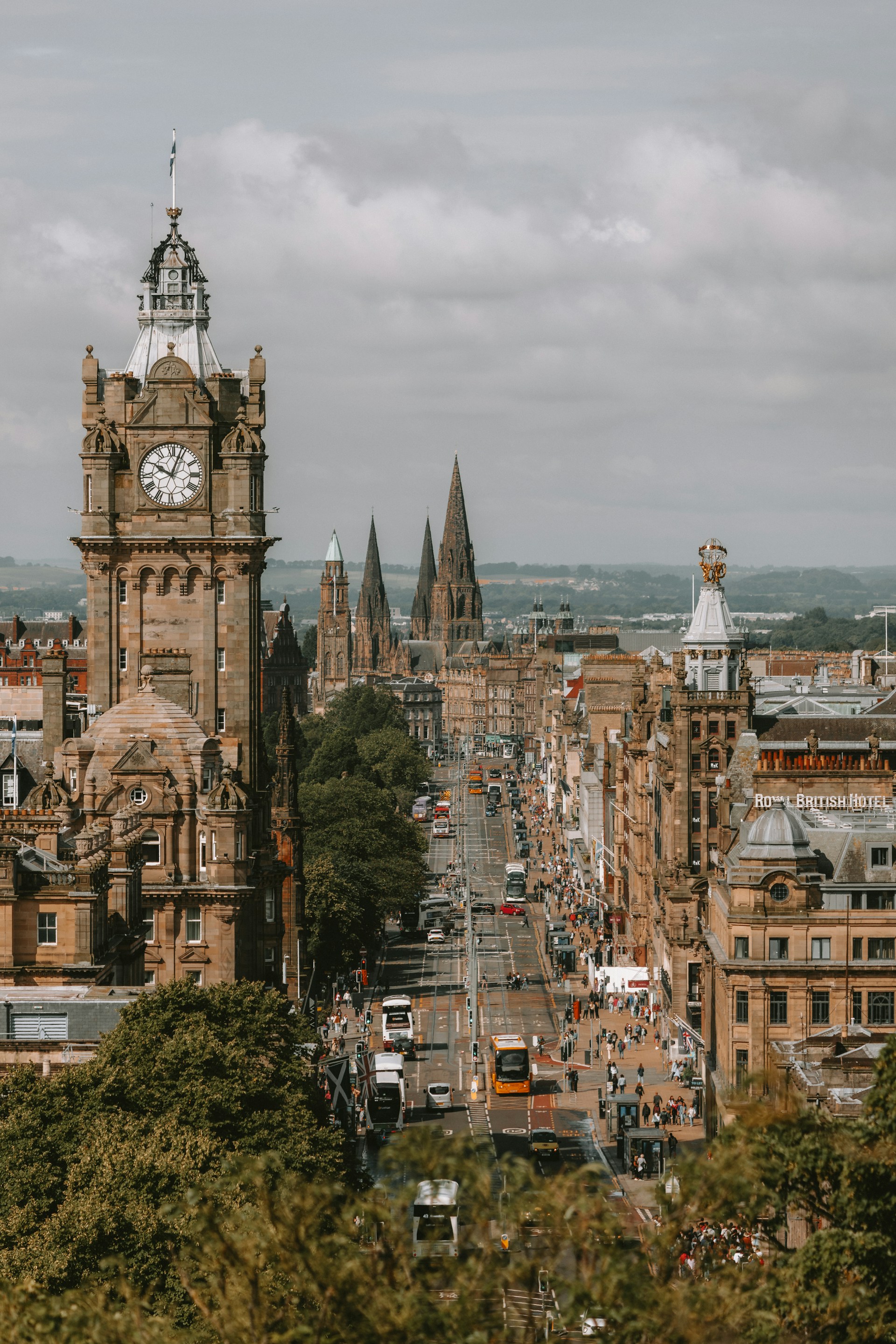 A large clock tower towering over a city