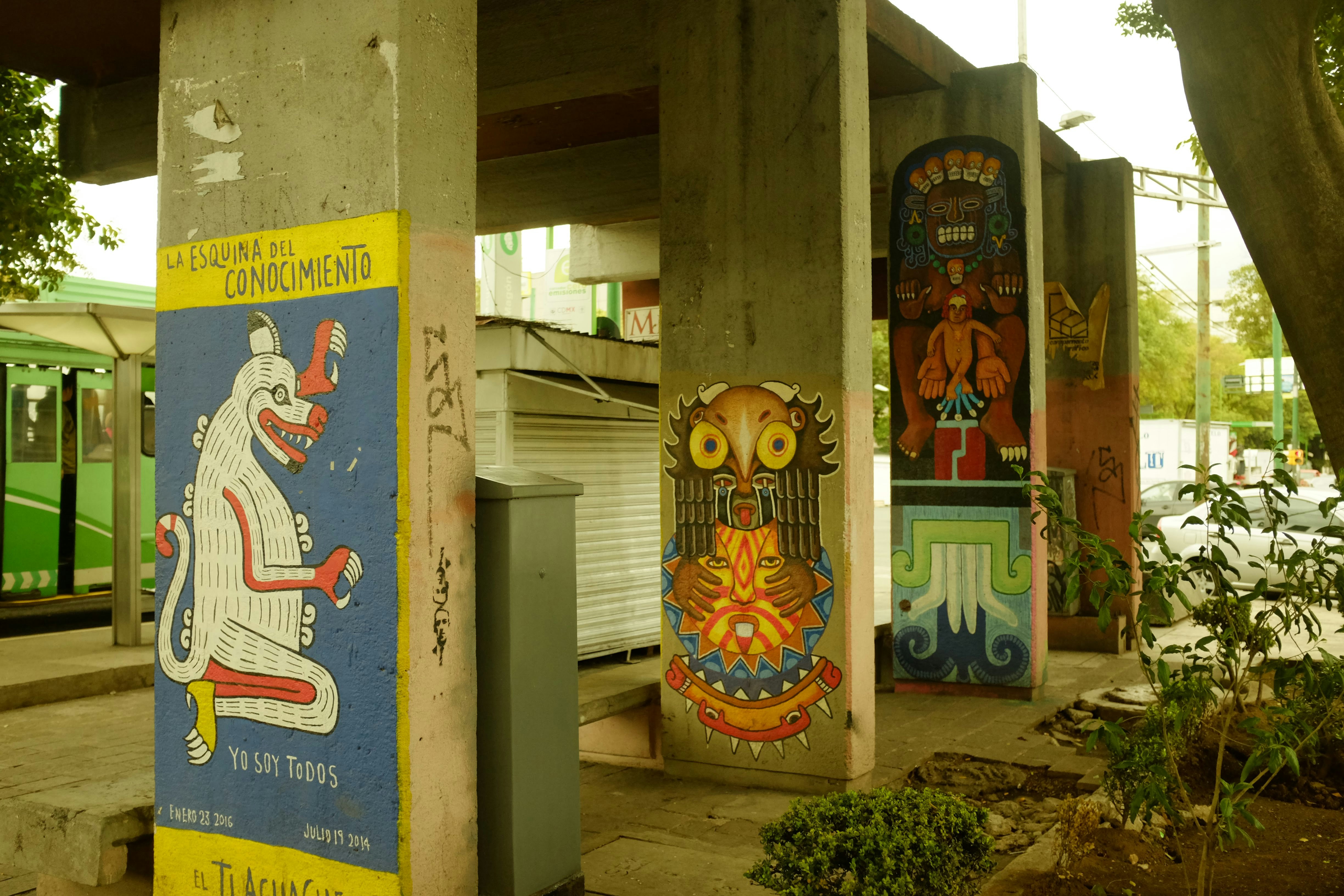 A bunch of signs that are on the side of a building, 