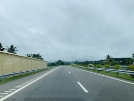 A picture taken from a car of a highway