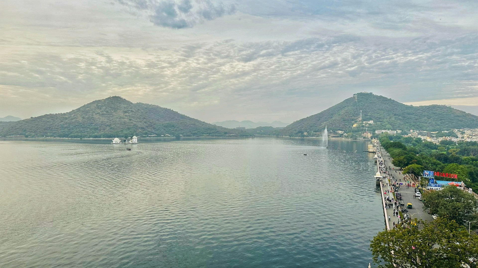 A view of a body of water with mountains in the background