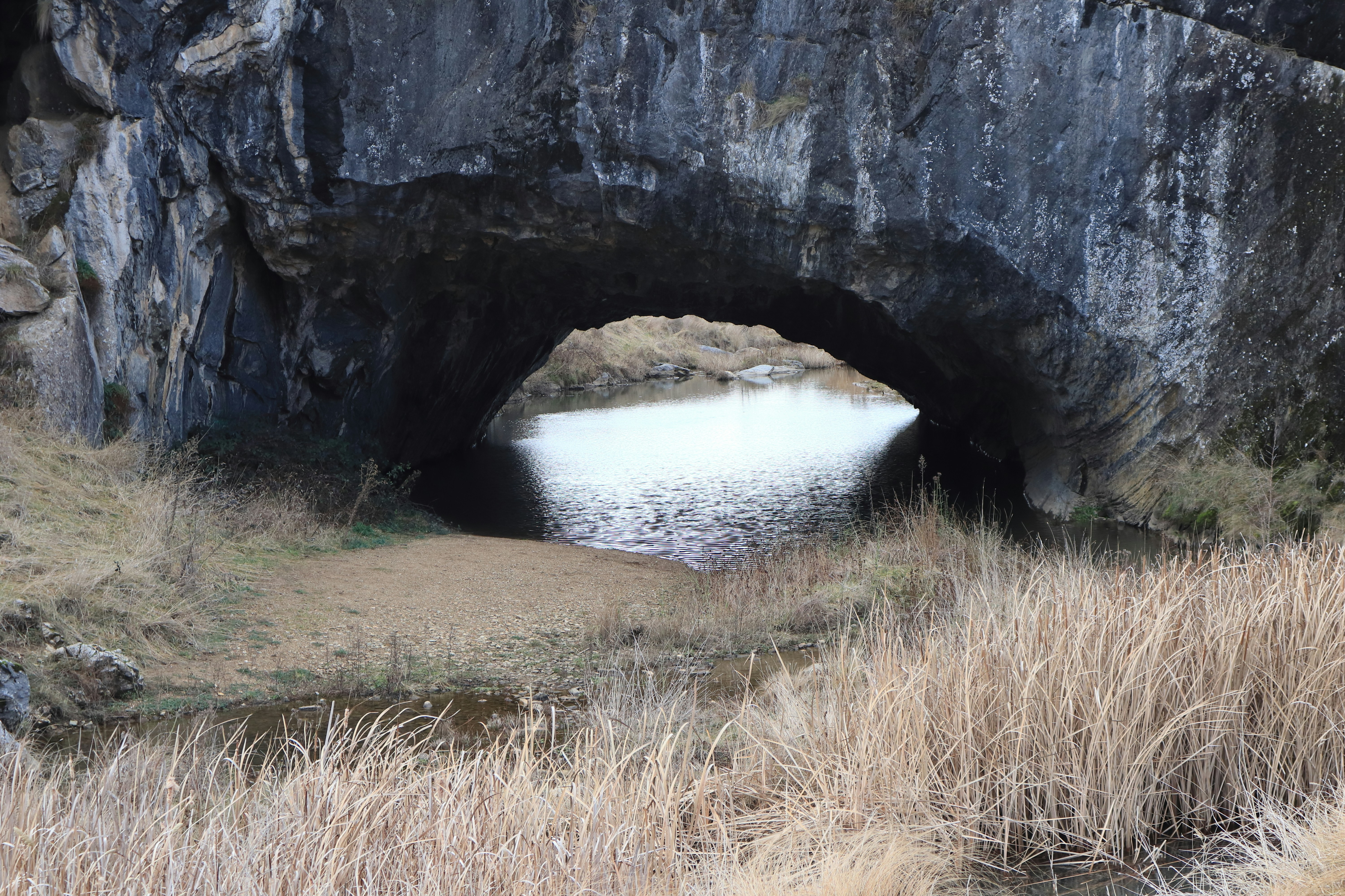 A large cave with a small cave entrance