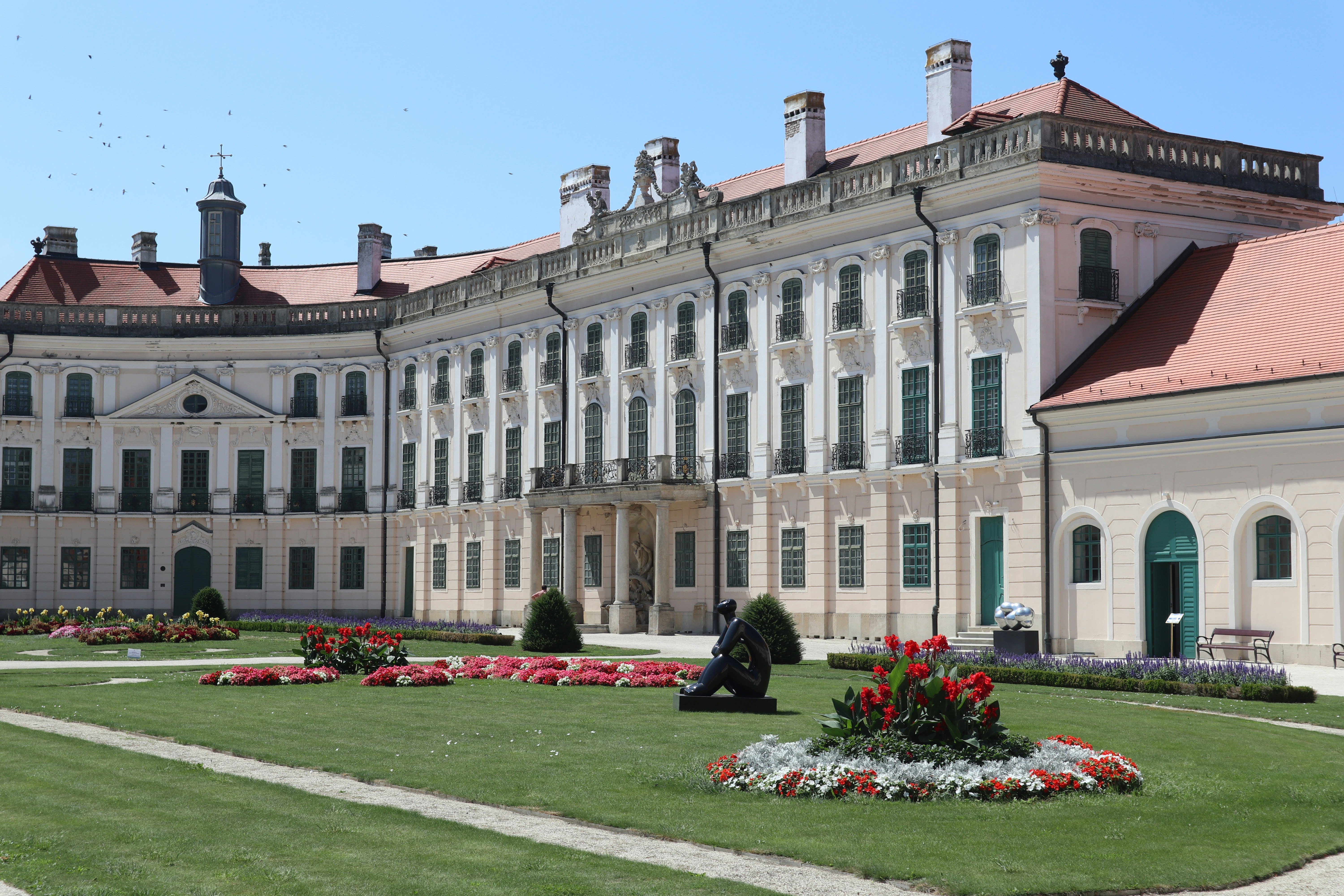 A large building with a lawn in front of it
