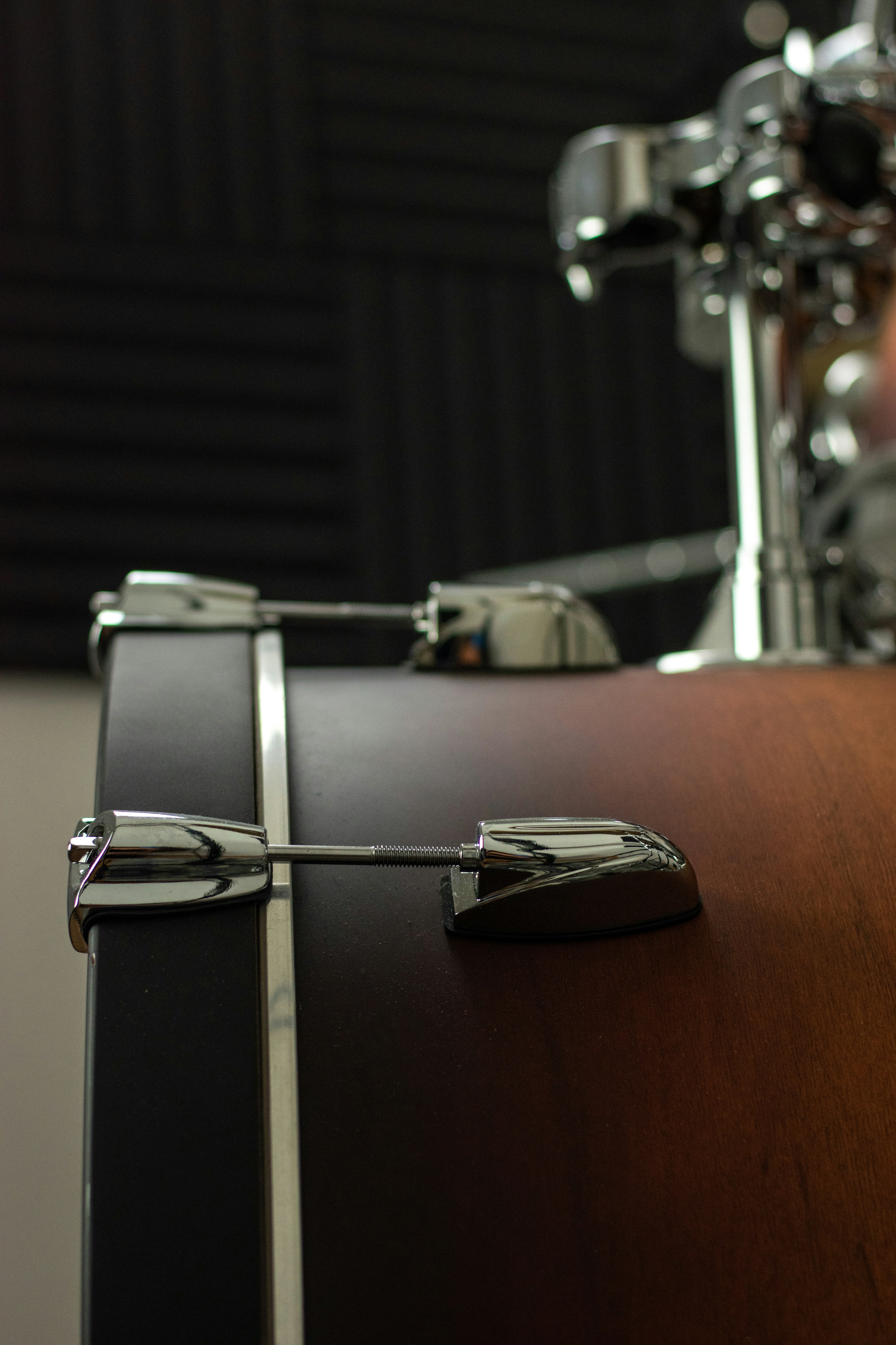 A close up of a drum case with a person in the background