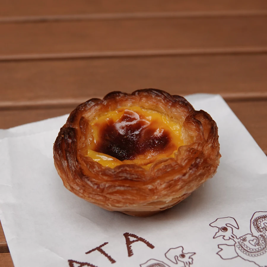 Pastel de nata on a paper napkin
