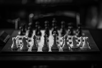 A black and white photo of a chess board