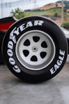 A close up of a tire on a car