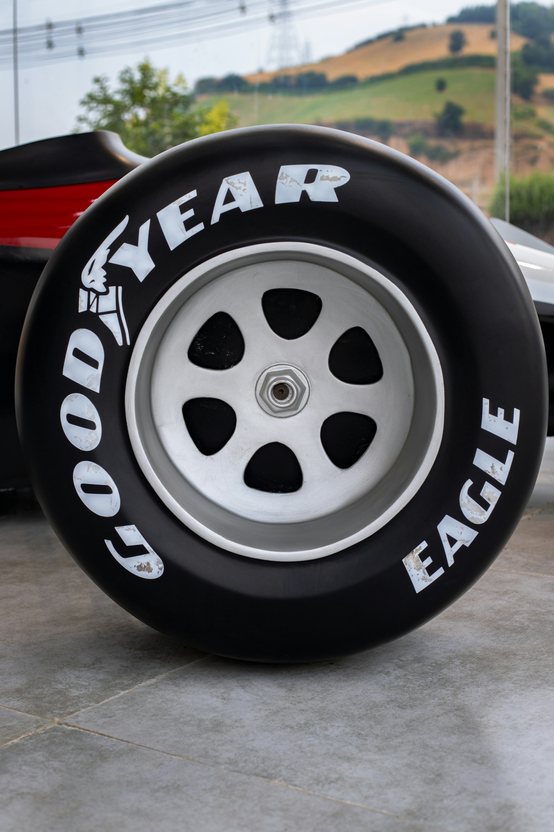 A close up of a tire on a car