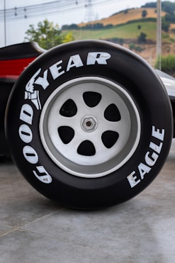 A close up of a tire on a car