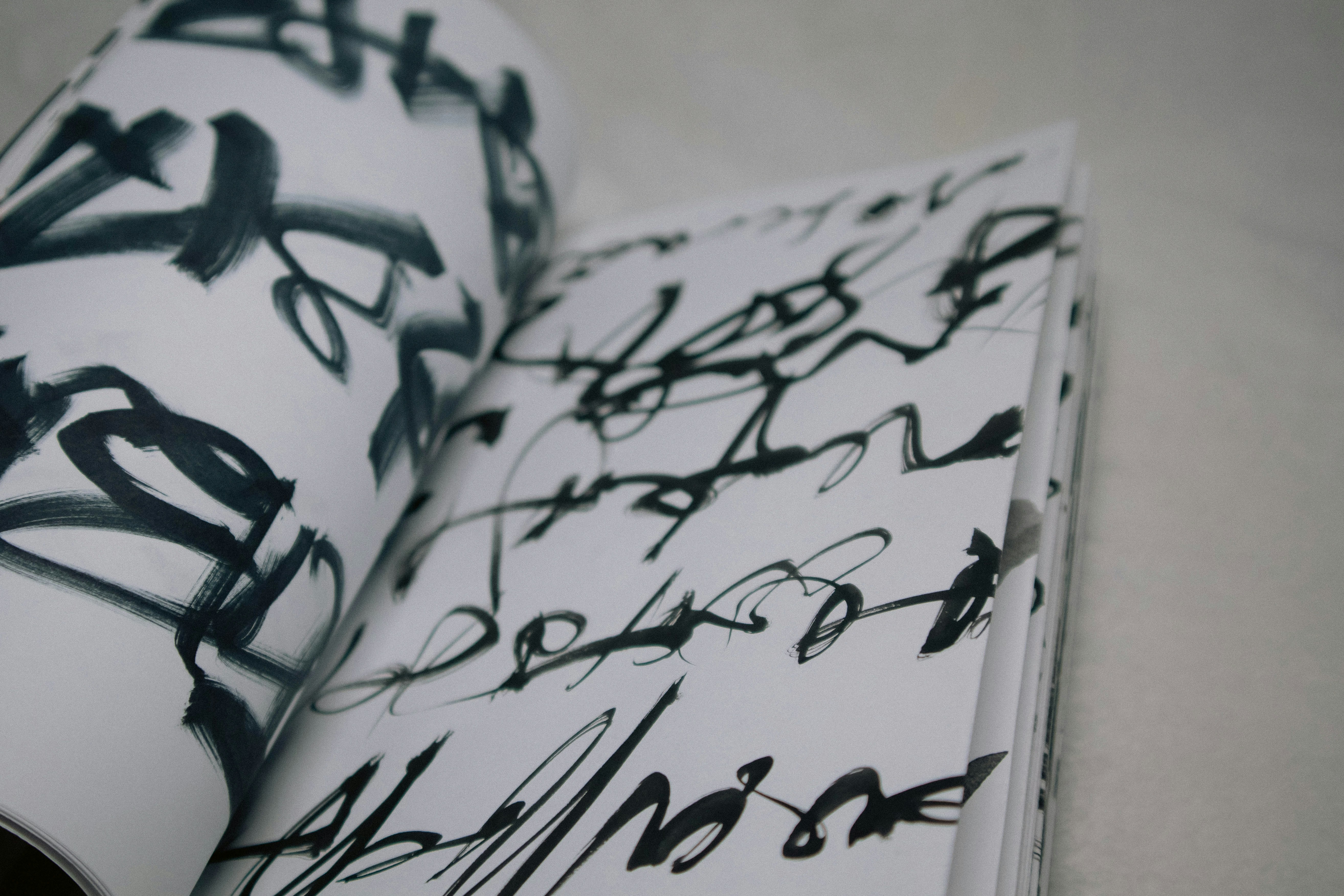 A close up of a book with writing on it