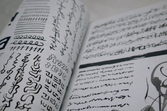 A close up of a book with writing on it