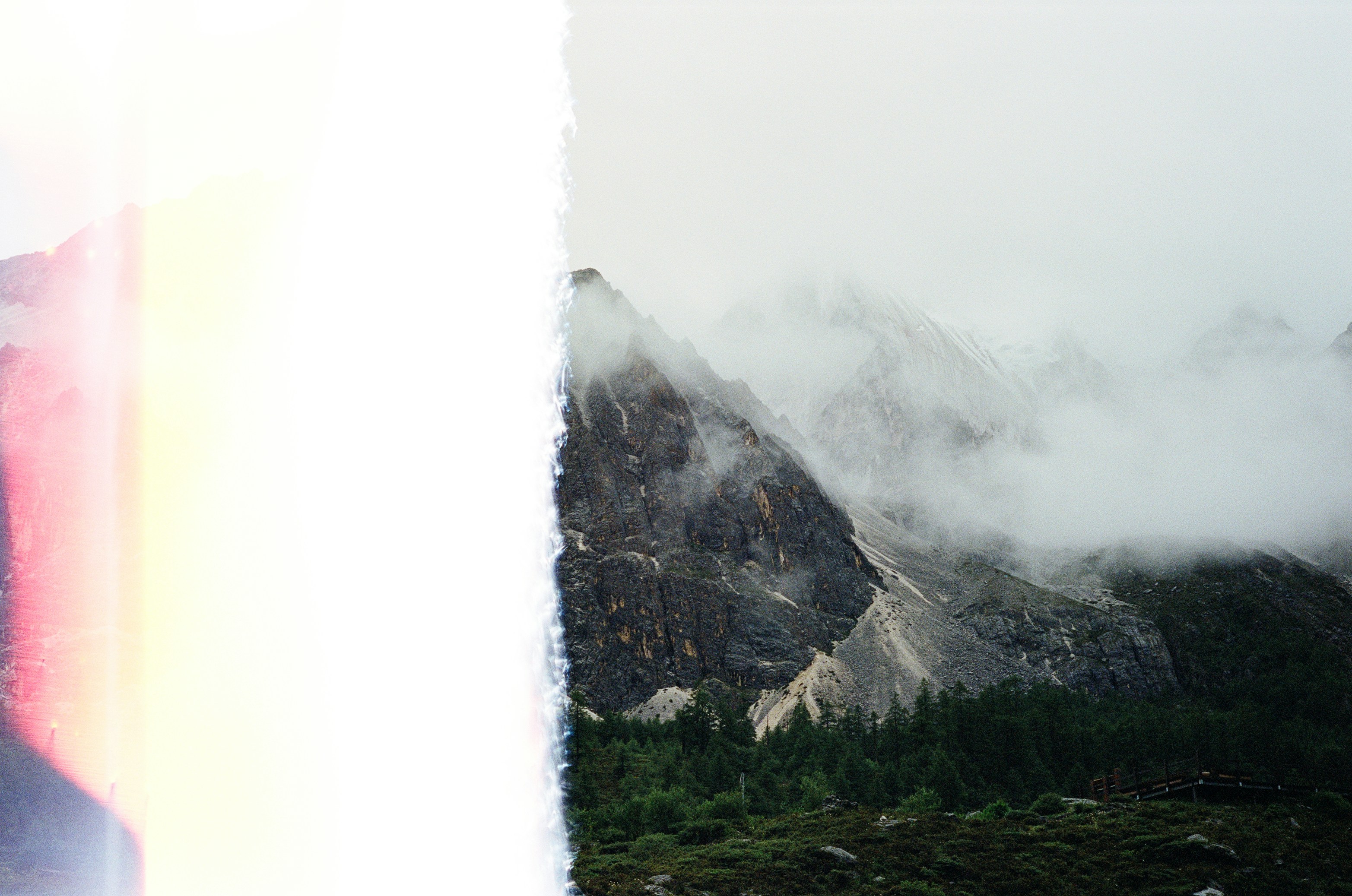 A view of a mountain range through a window