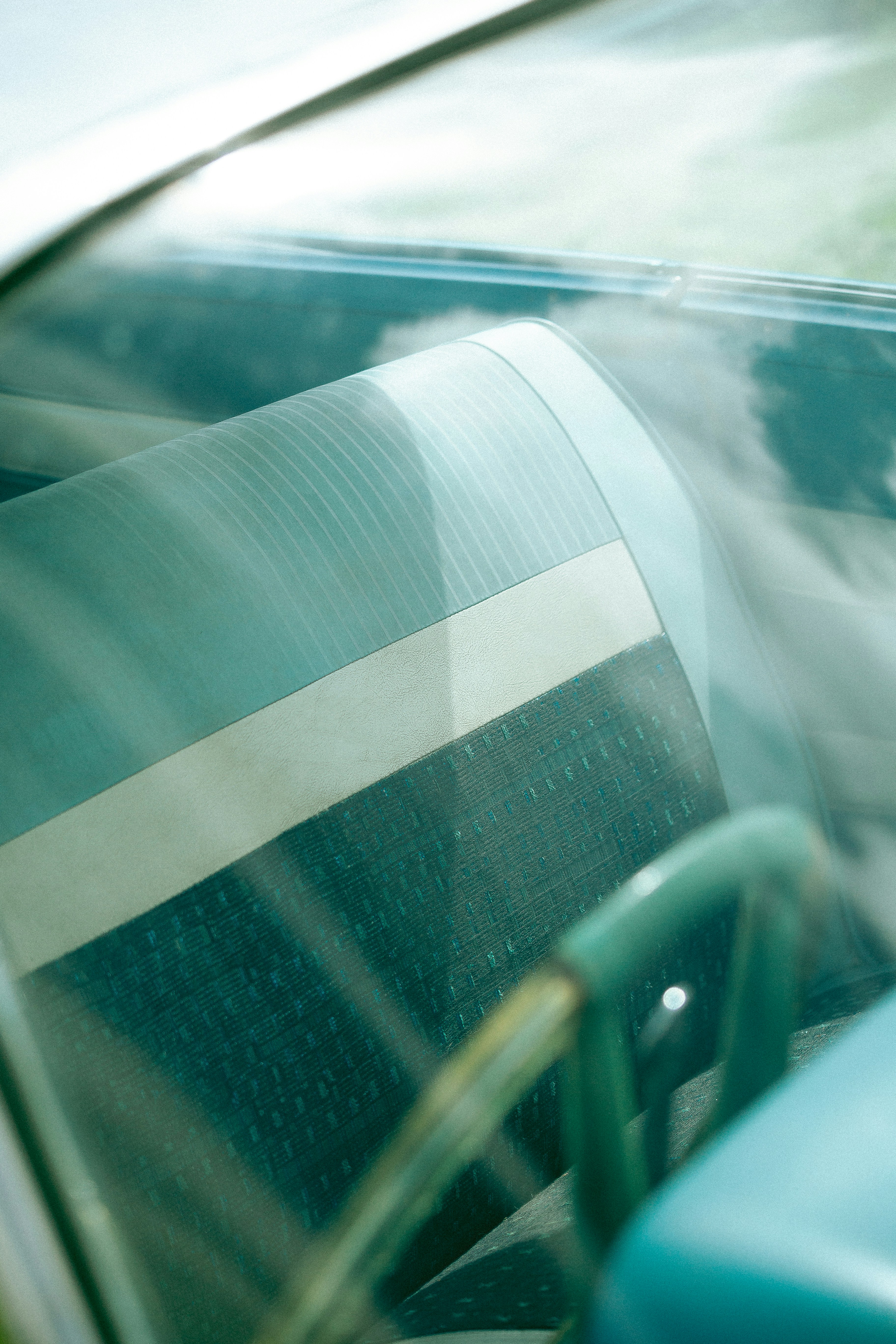 A car with a blue seat and a green seat