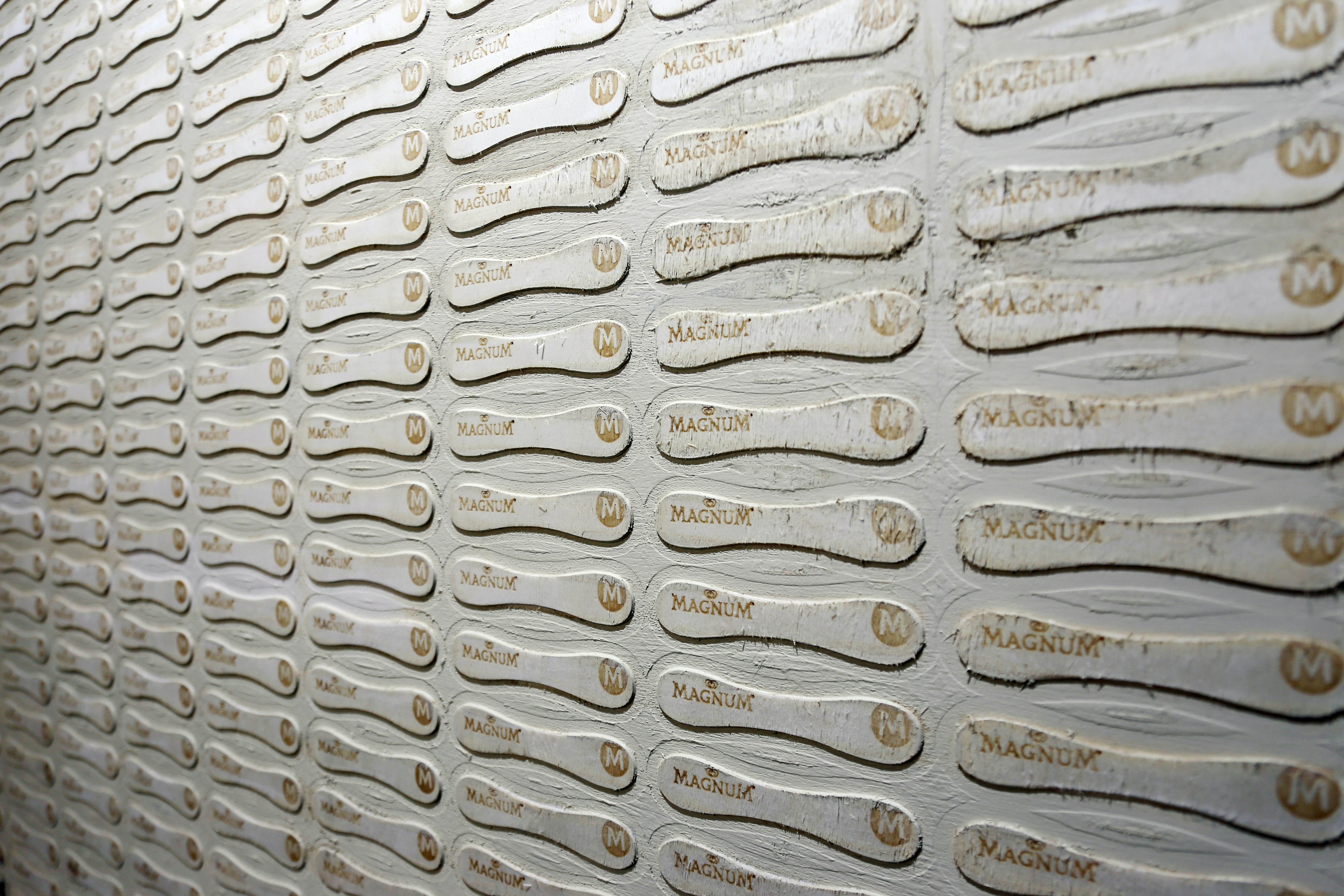 A close up of a wall with a number of objects on it