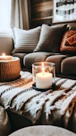 A living room with a couch and a candle