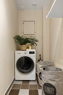 A laundry room with a washer and dryer