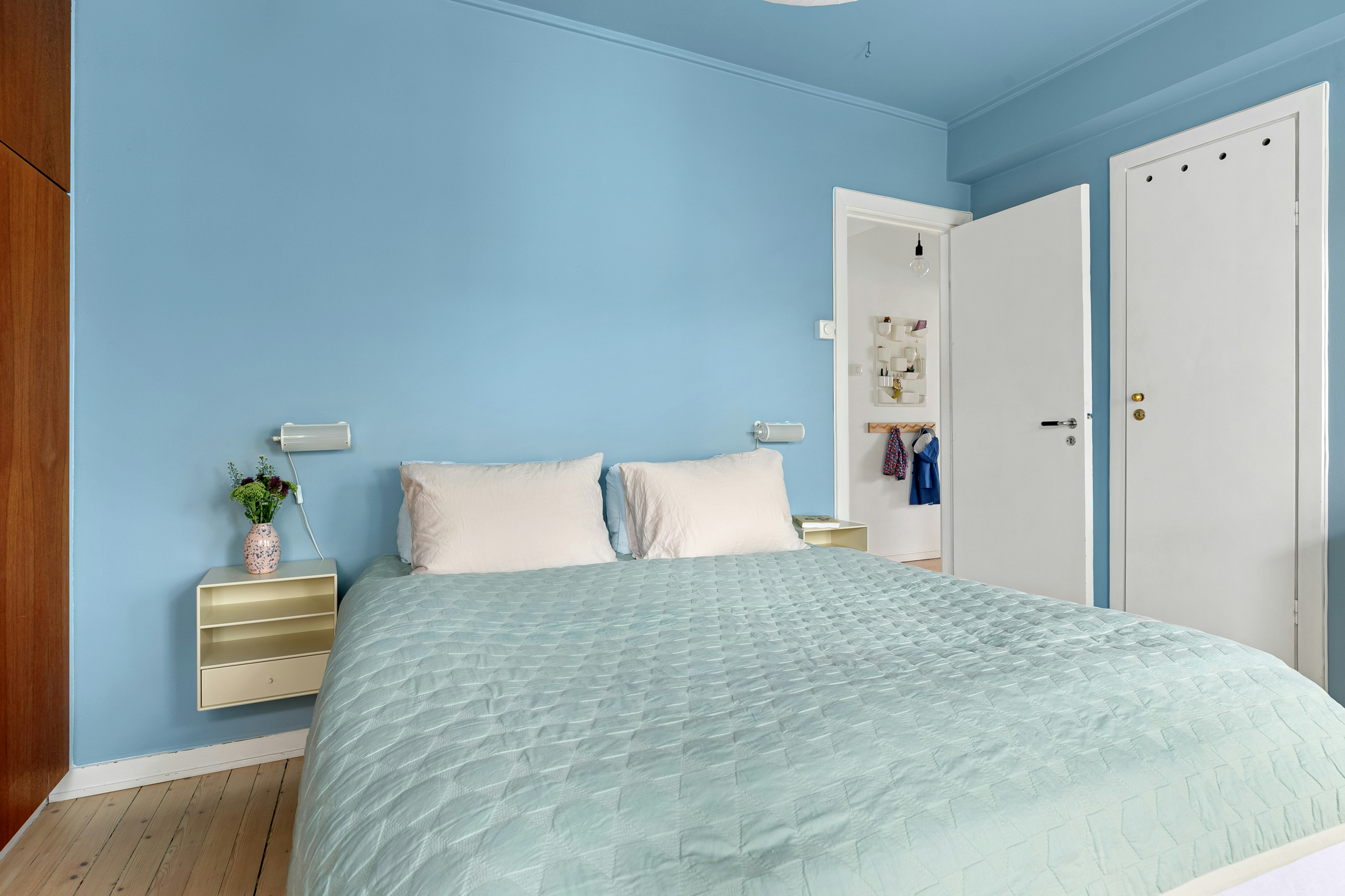 bedroom painted in a soft, calming blue or green - sample bedroom paint colors