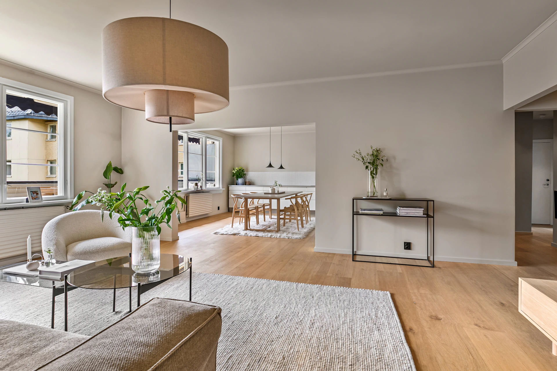 A living room filled with furniture and a large window