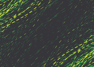 A green and black background with small white dots