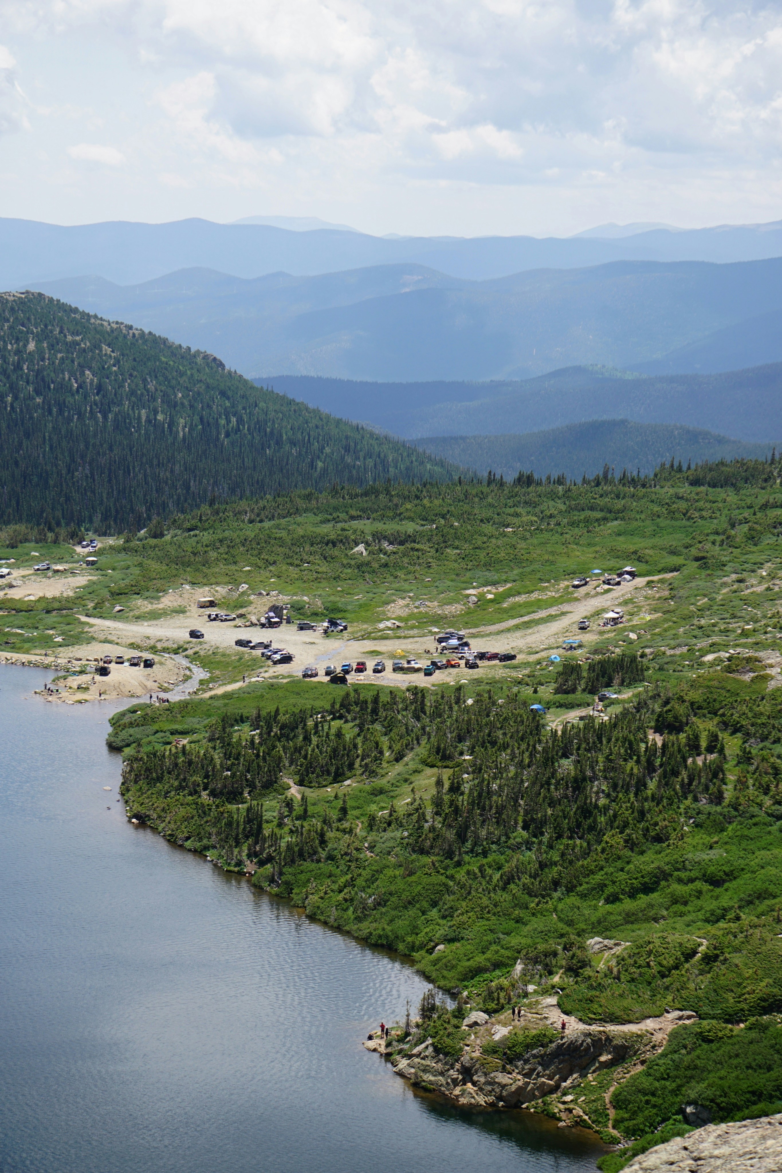 A large body of water surrounded by mountains