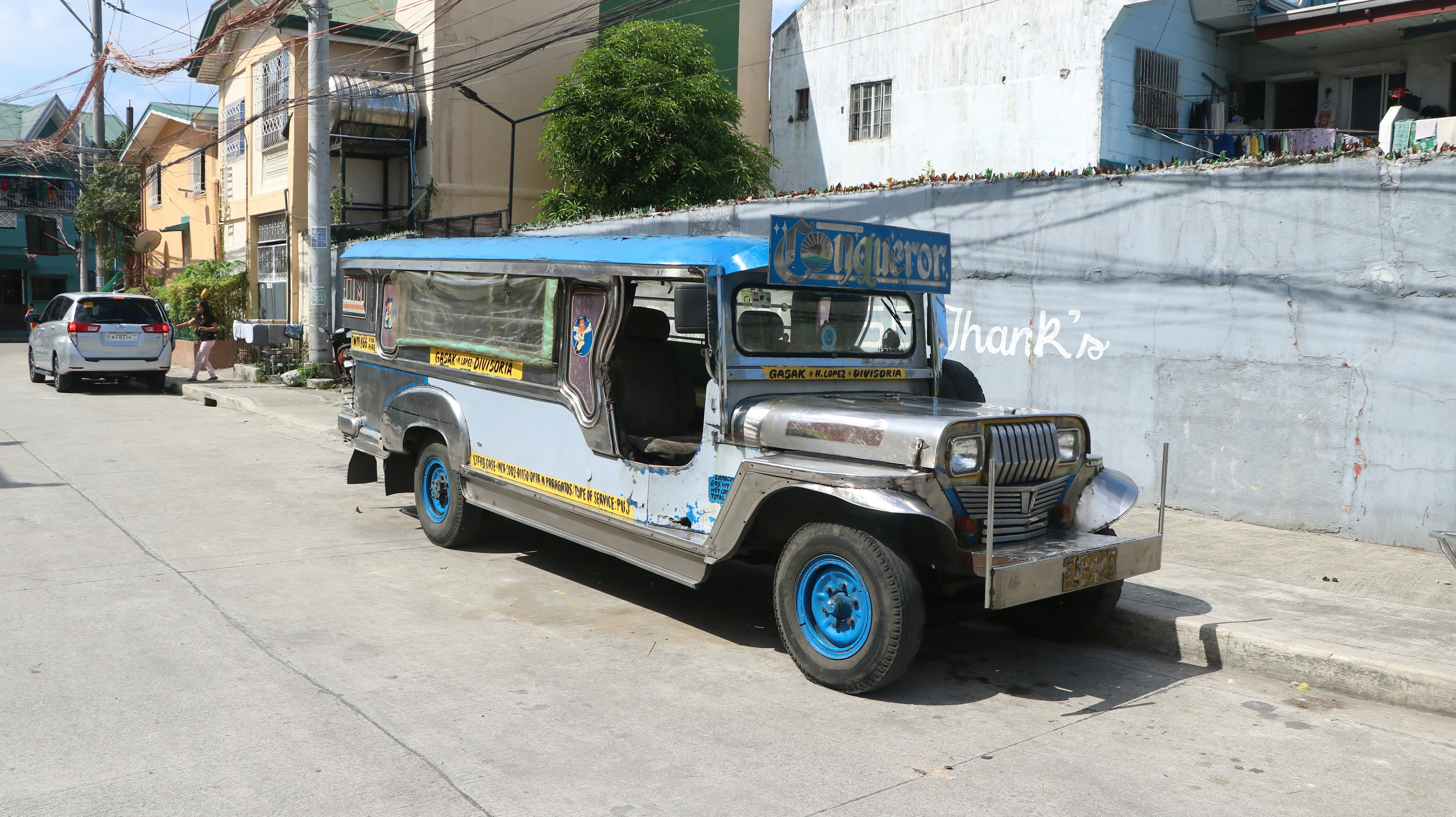 A jeep is parked on the side of the road