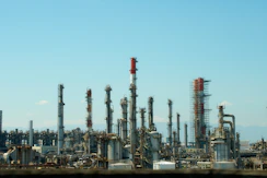 A factory with a lot of pipes and buildings