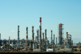 A factory with a lot of pipes and buildings