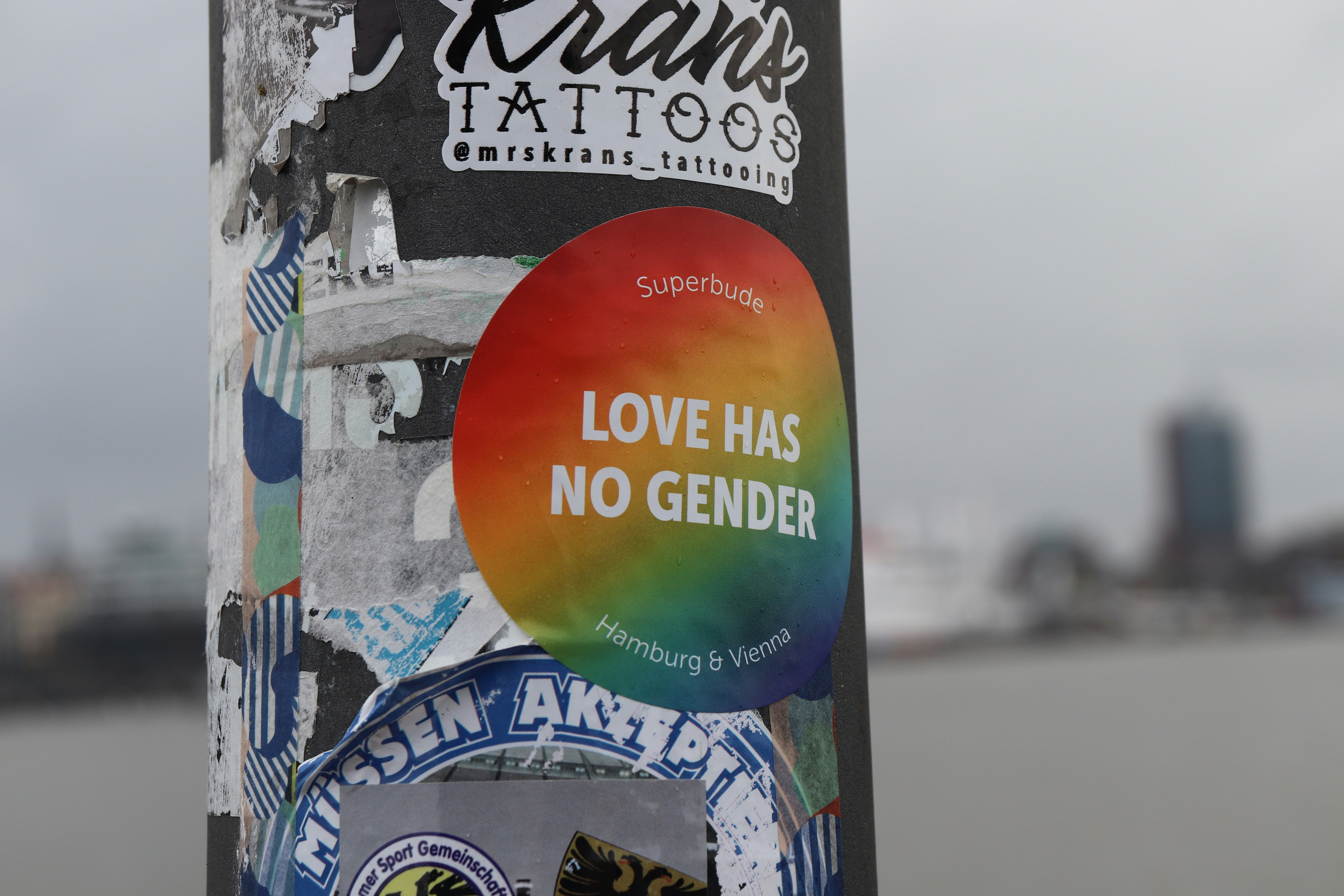 A close up of a sticker on a pole