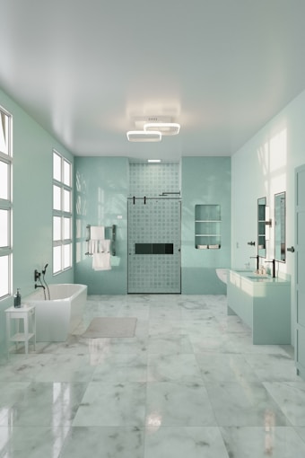 A large bathroom with a tub, sink, and shower