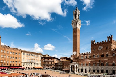 A large clock tower towering over a city