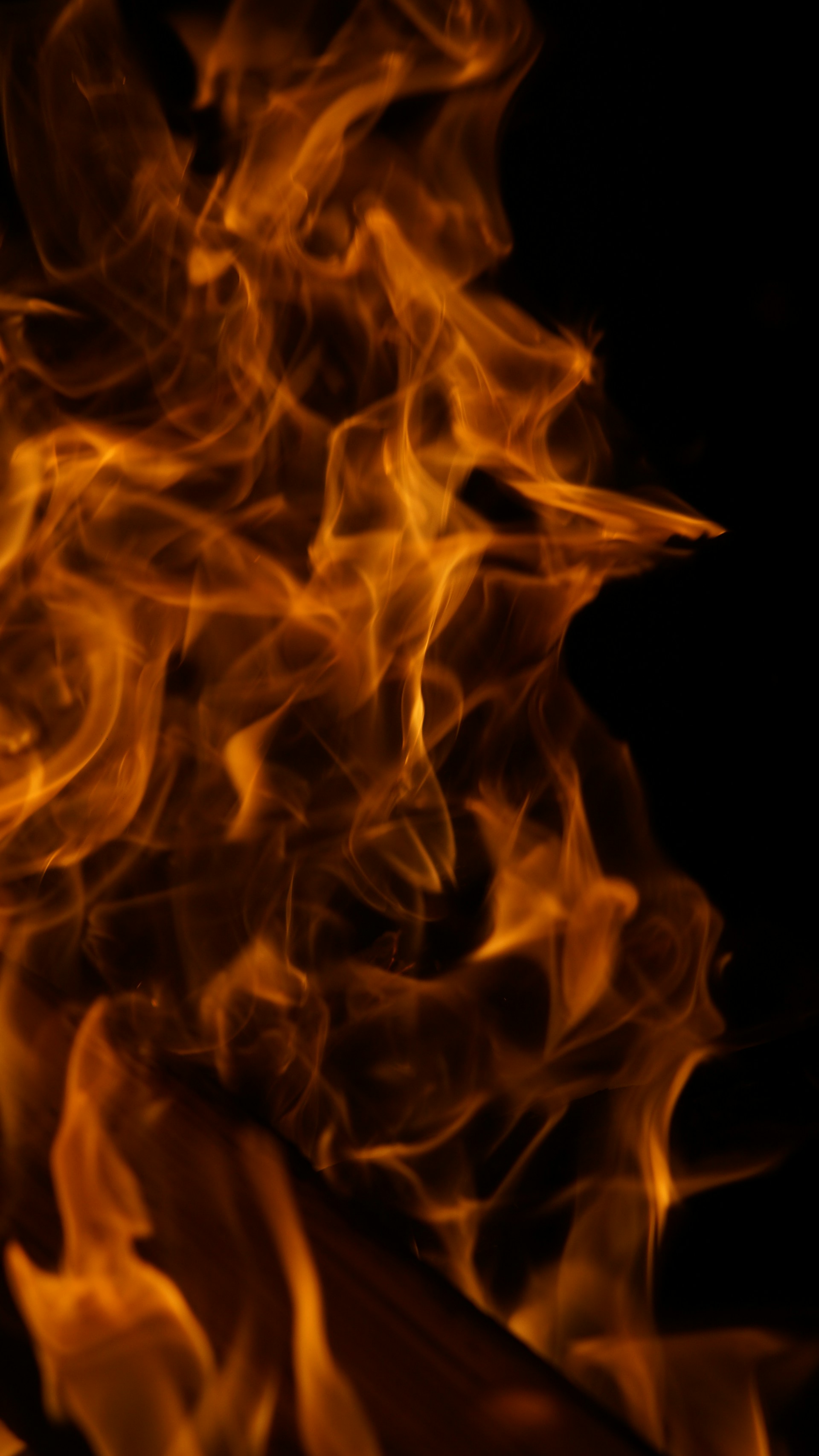 A close up of a fire on a black background