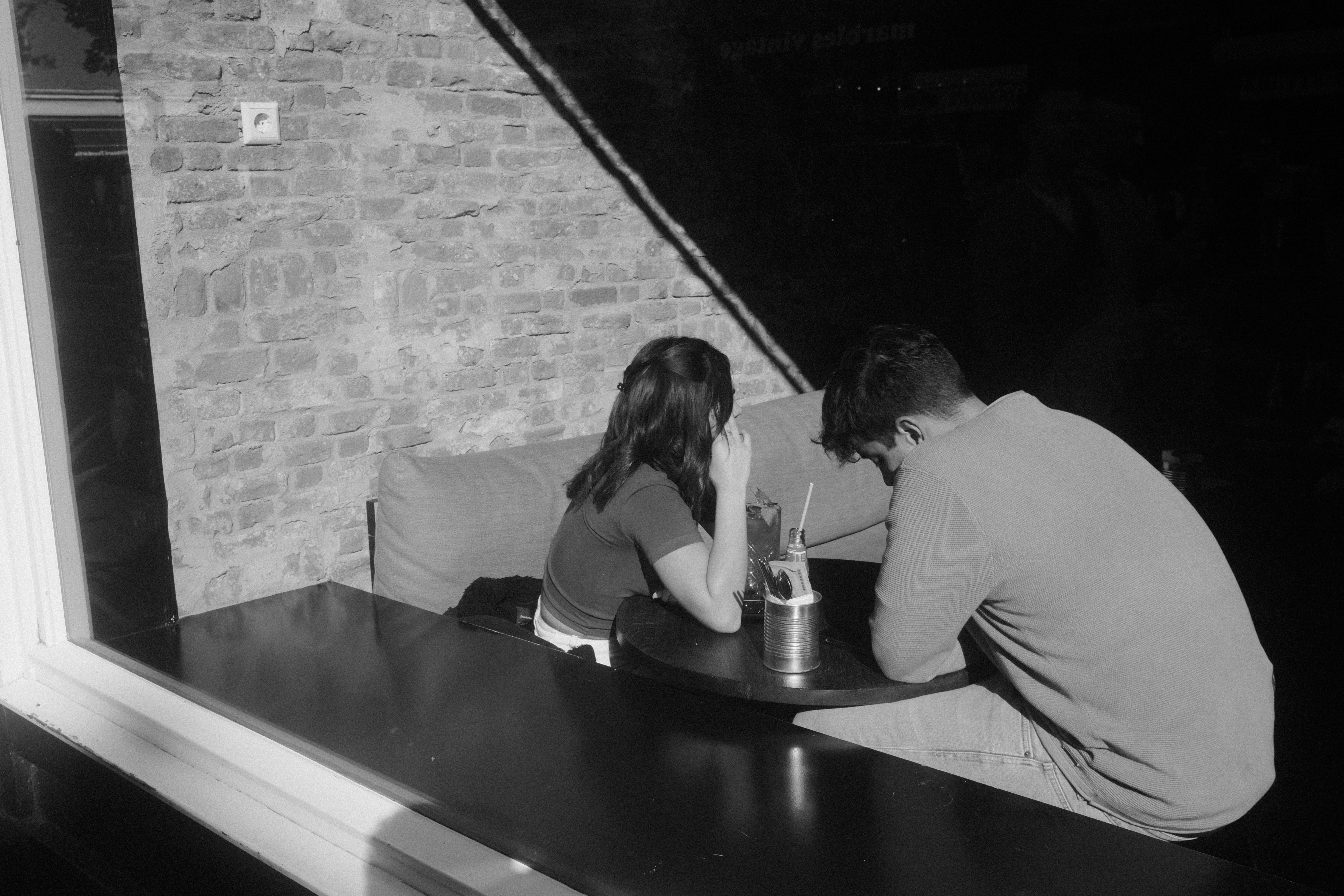 A man and a woman sitting at a table