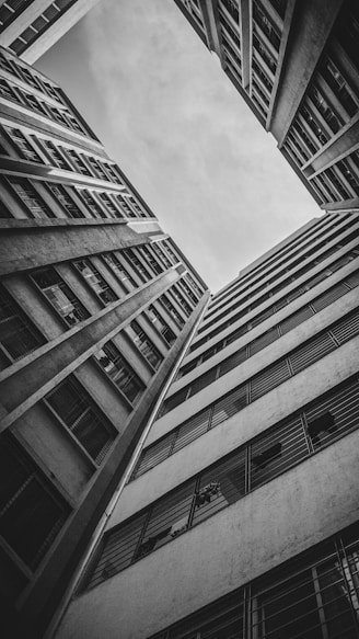 A black and white photo of tall buildings