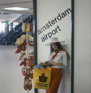Amsterdam airport display with shoes and mannequin