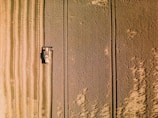 A close up of a metal door with a rusted handle