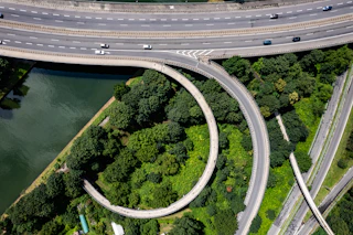An aerial view of a highway intersection in a city