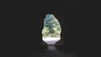 A dark tunnel with a light at the end