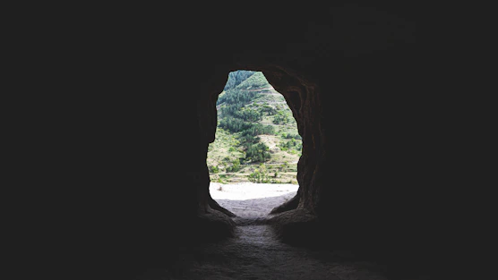 A dark tunnel with a light at the end