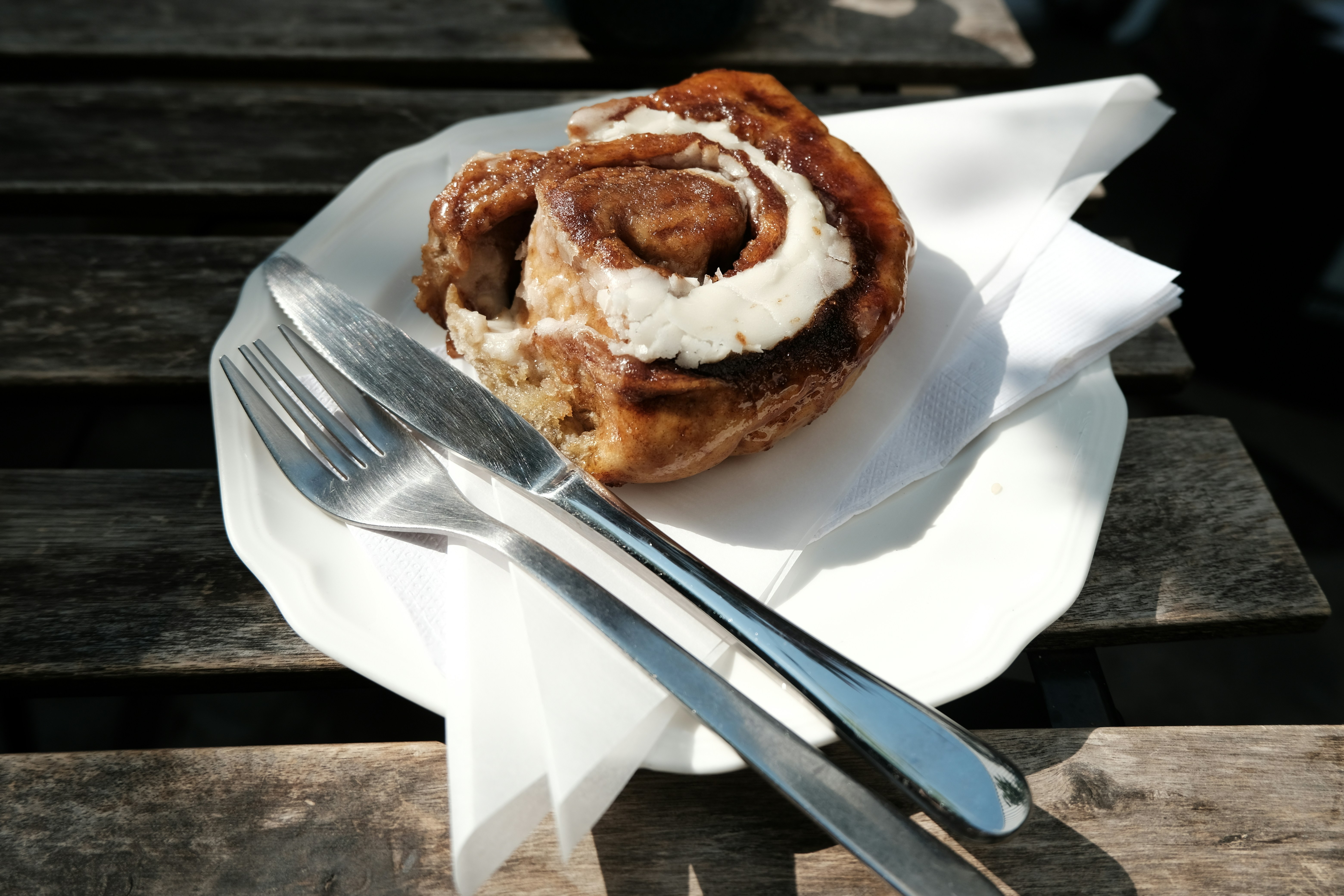 Cinnamon roll with a fork
