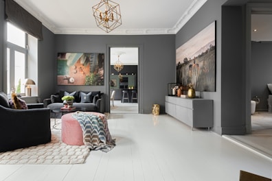 A living room filled with furniture and a chandelier