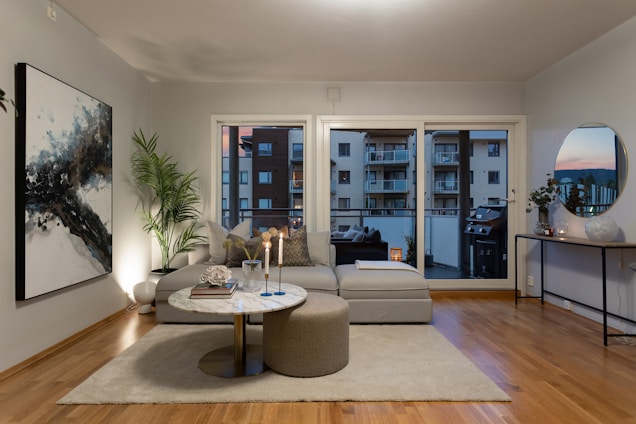 A living room filled with furniture and a large window