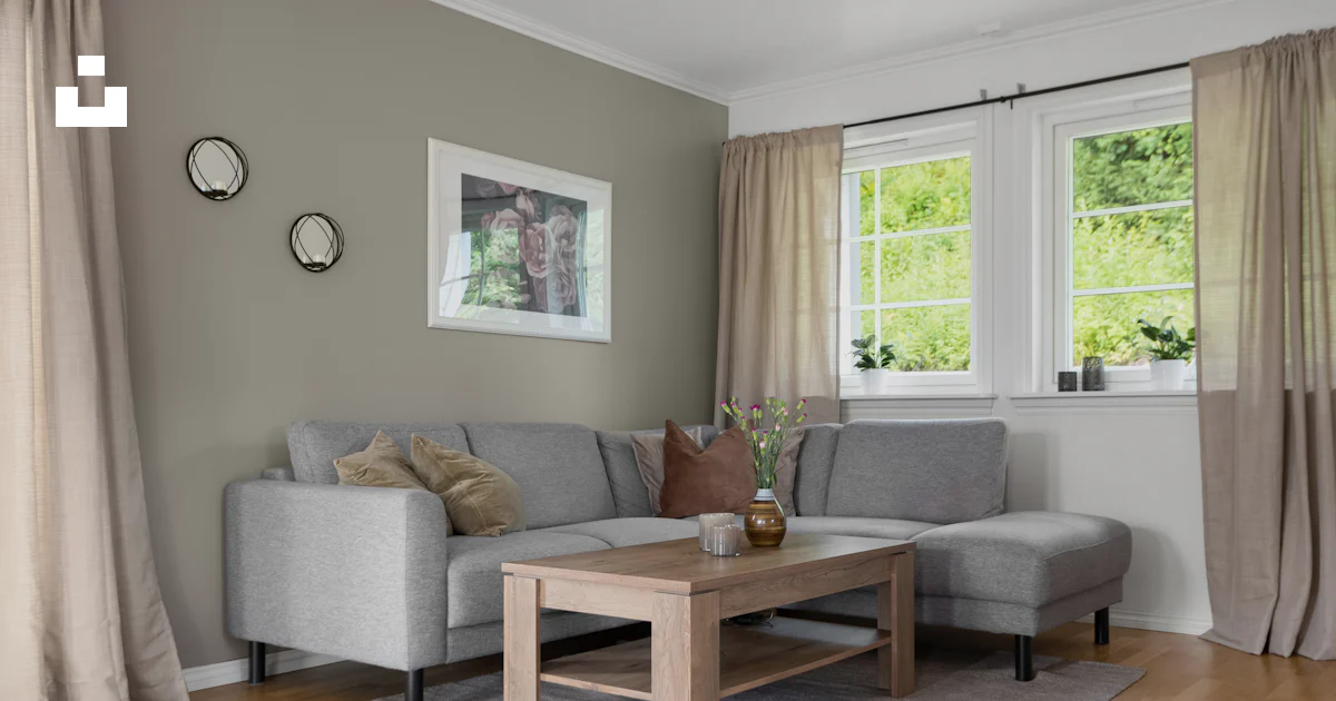 A living room filled with furniture and a wooden floor photo – Free ...