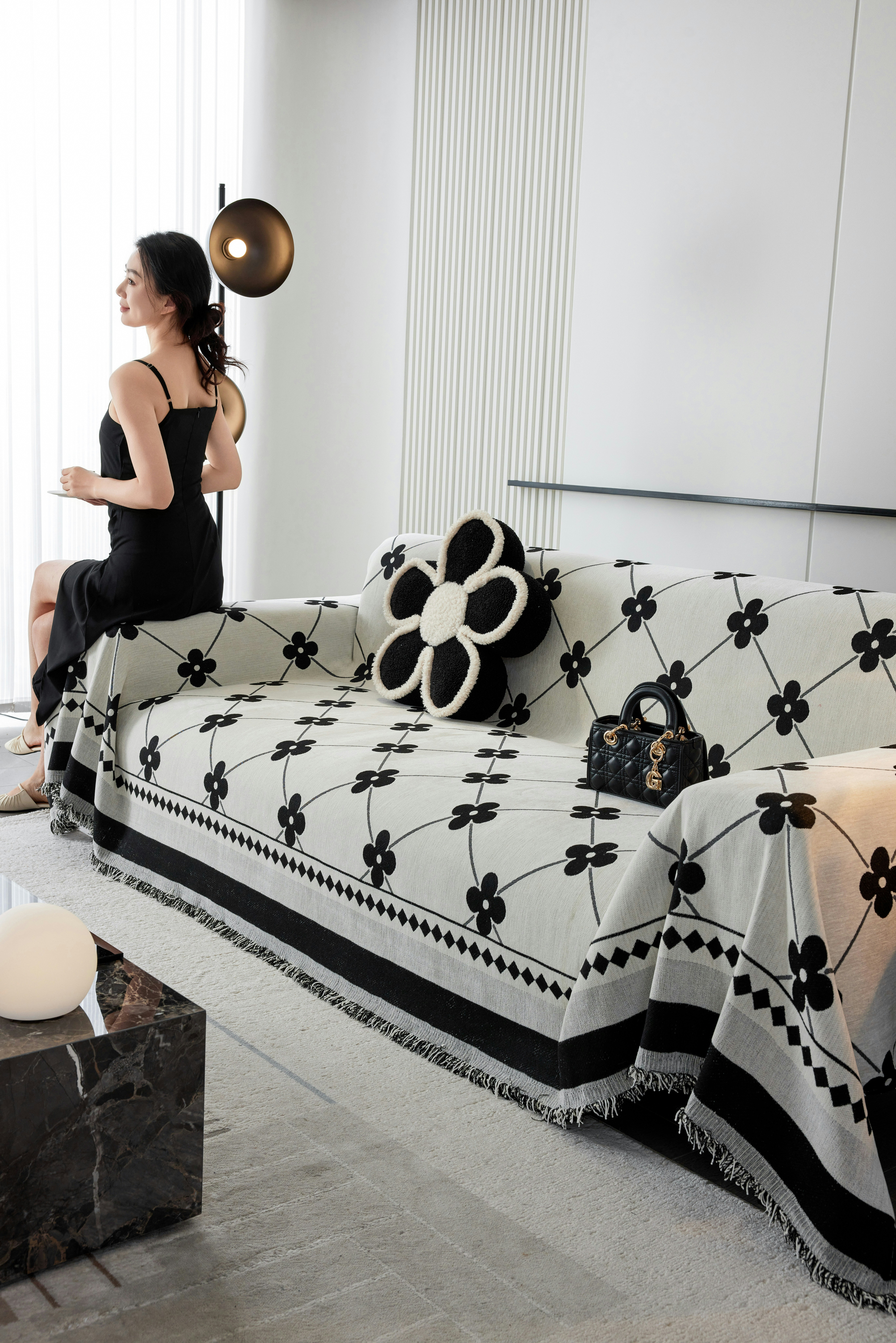 A woman sitting on a couch in a living room