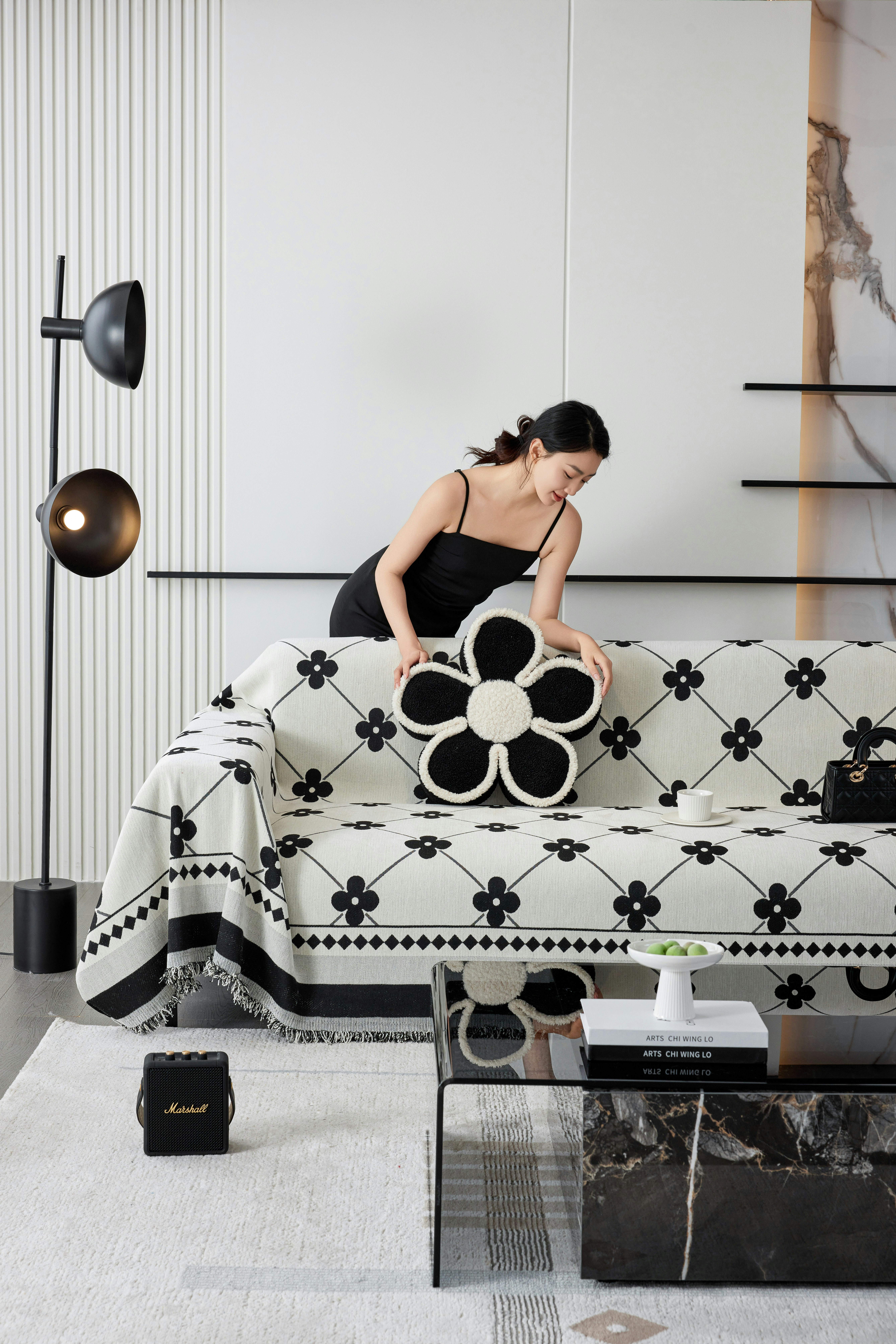 A woman sitting on a couch in a living room