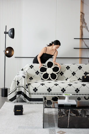 A woman sitting on a couch in a living room