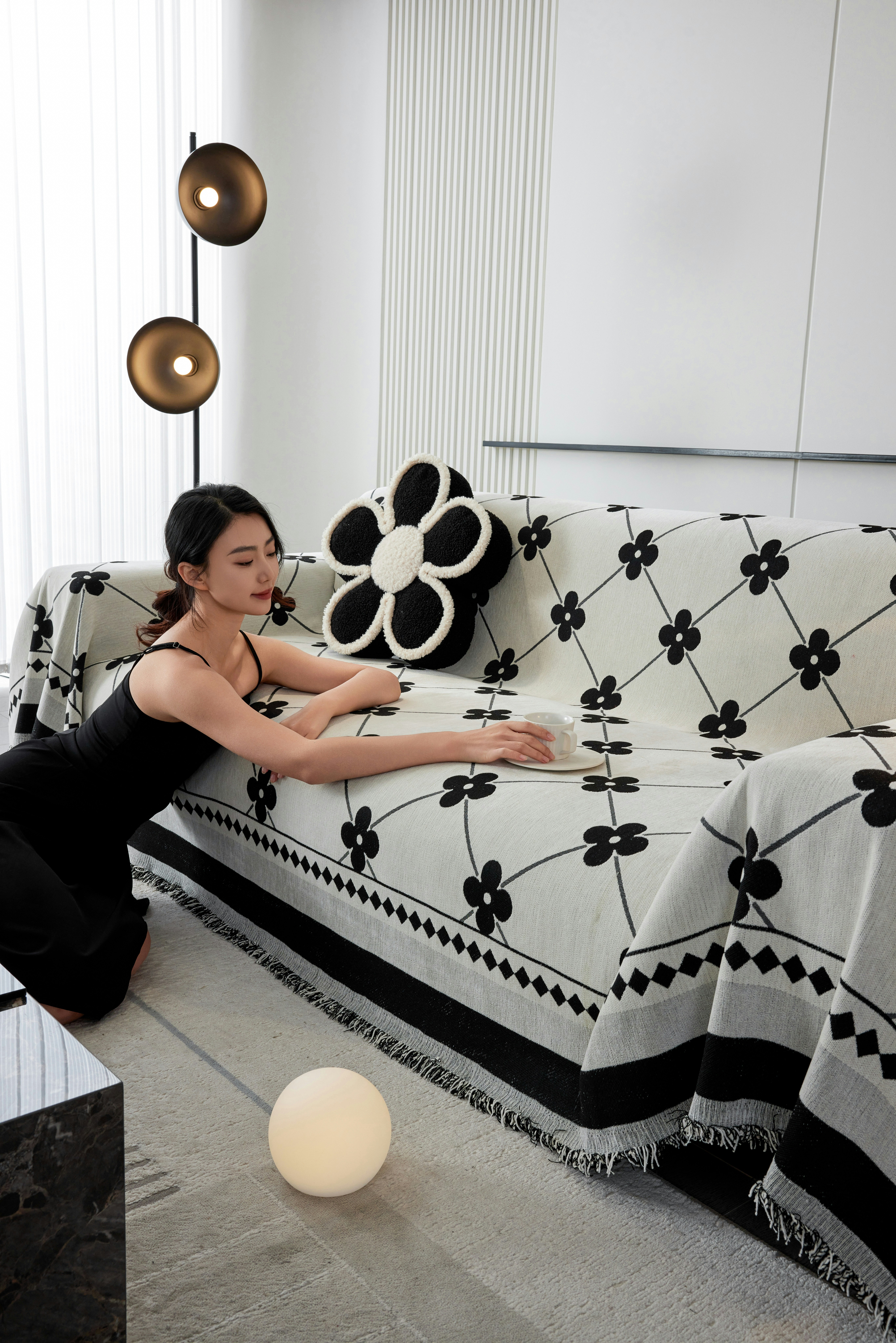 A woman sitting on a couch in a living room