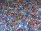 A pile of plastic bottles filled with water