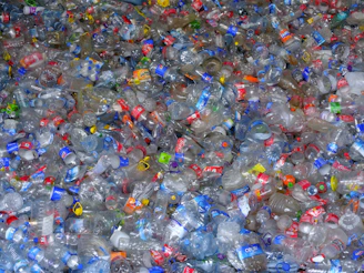 A pile of plastic bottles filled with water